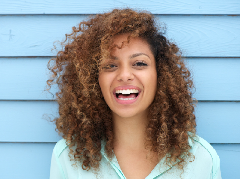 St. Johnsbury Dental Associates - Smiling Girl Background